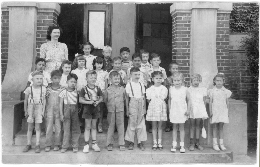 Same class photo after professional digital restoration