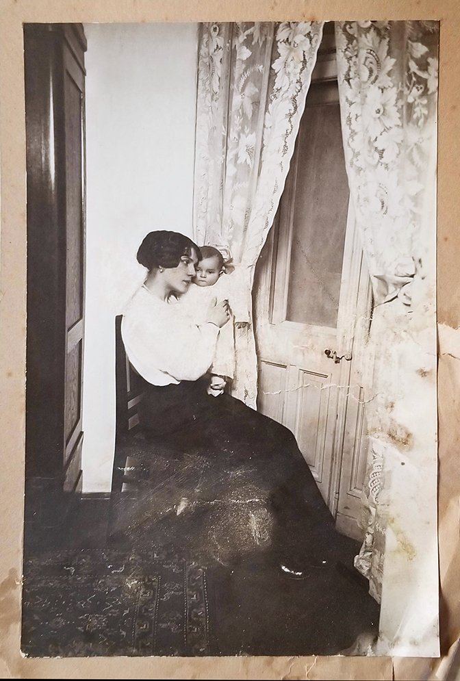 Faded early 1900s portrait before restoration